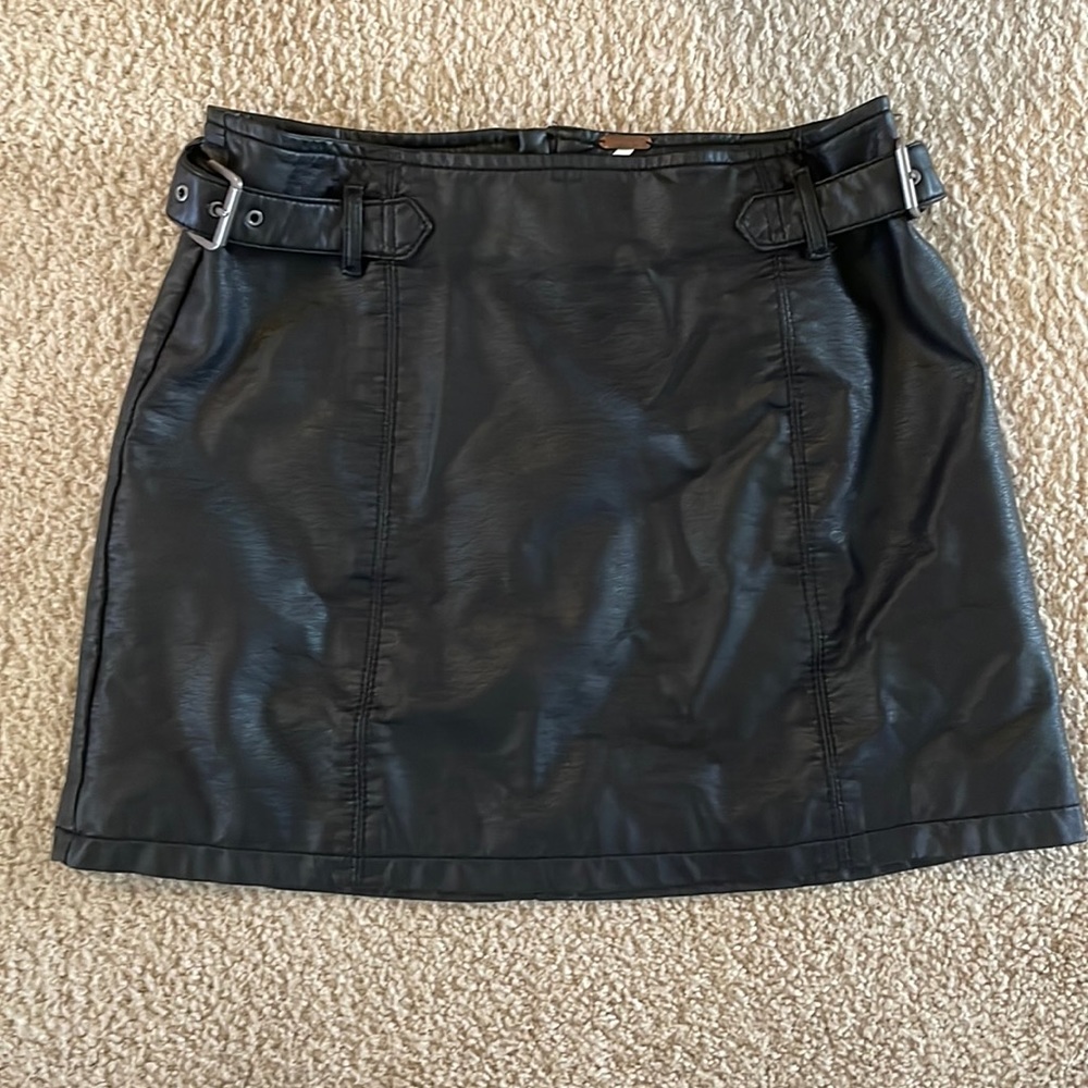 Free People black vegan leather mini skirt with side buckles size 6